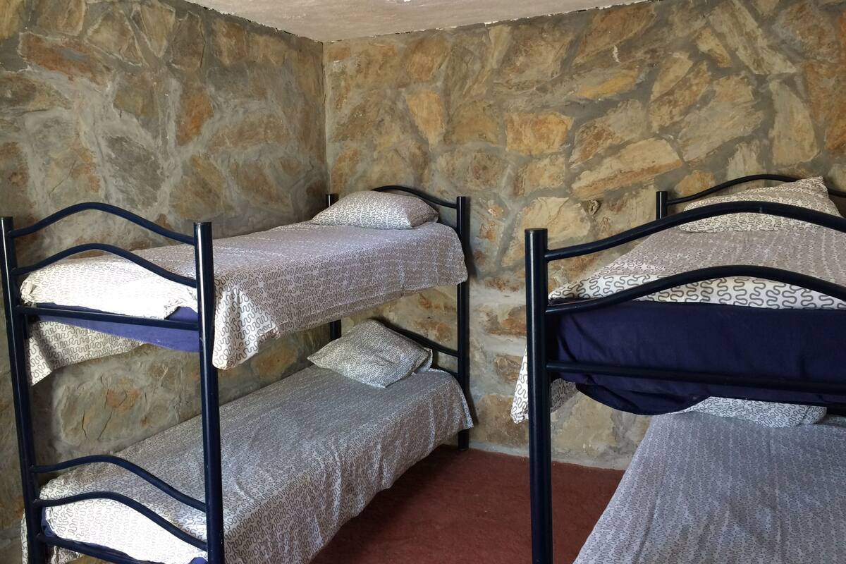 Huone, jaettu kylpyhuone (Refugios Starlight) | Vuodevaatteet