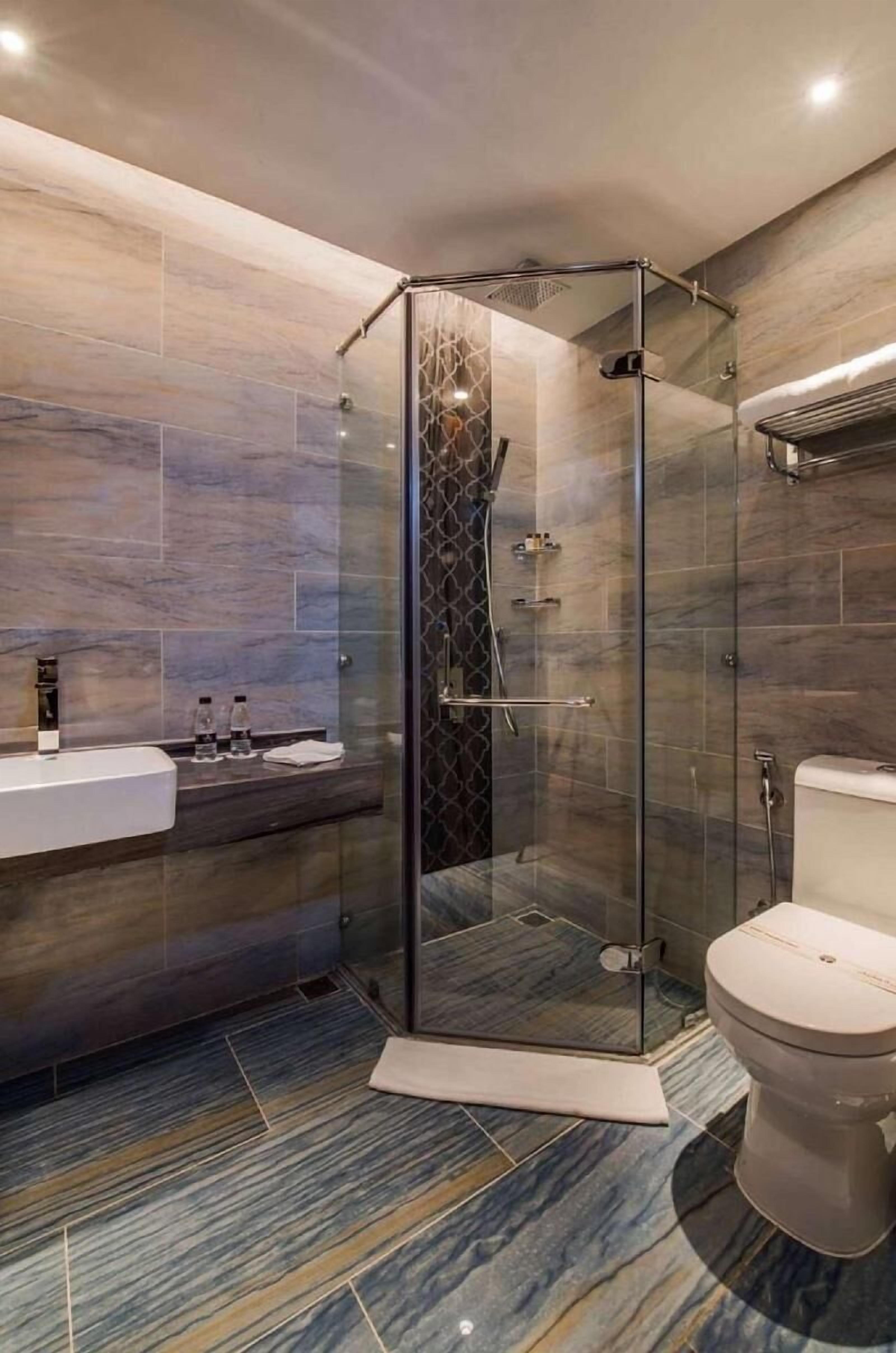 Bathroom | Shower, free toiletries, hair dryer, bathrobes