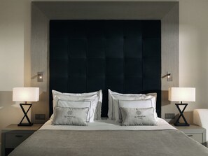 Suite executiva | Minibar, caixa forta a l'habitació, escriptori i bressols 