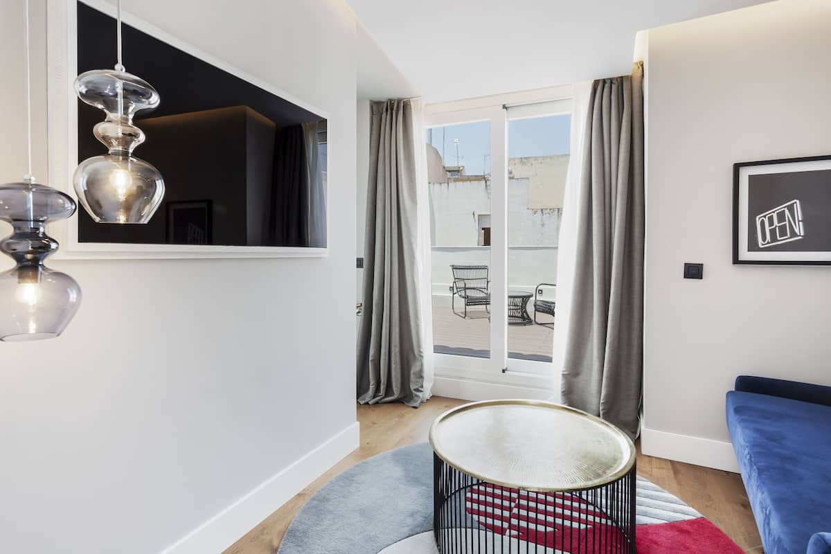 Duplex | Living area | Flat-screen TV