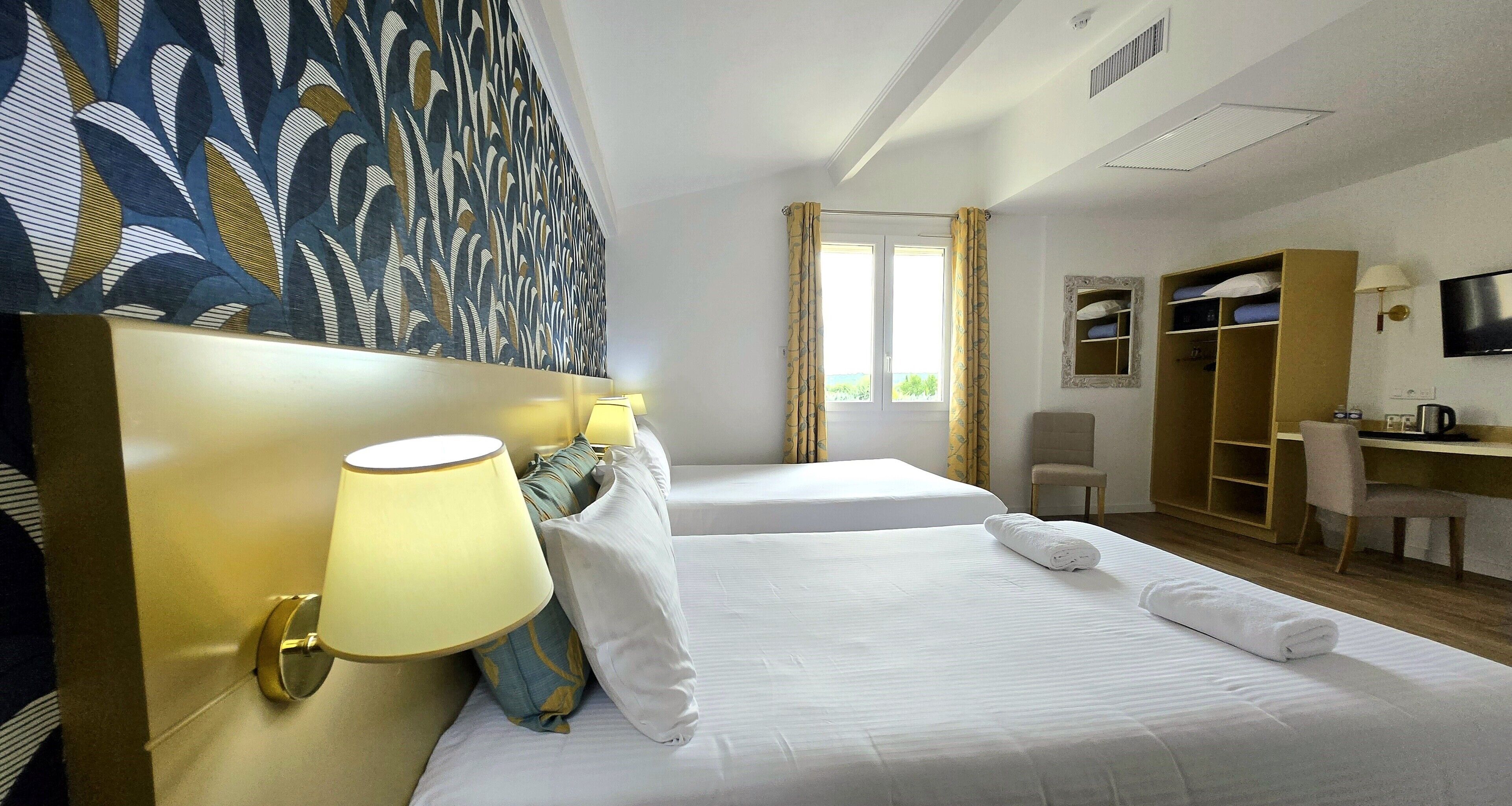 comfort quadruple room, mountain view | premium bedding, in-room safe, desk, laptop workspace