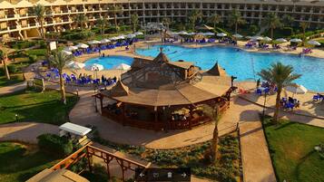 3 outdoor pools, open 9:00 AM to 6:00 PM, pool loungers