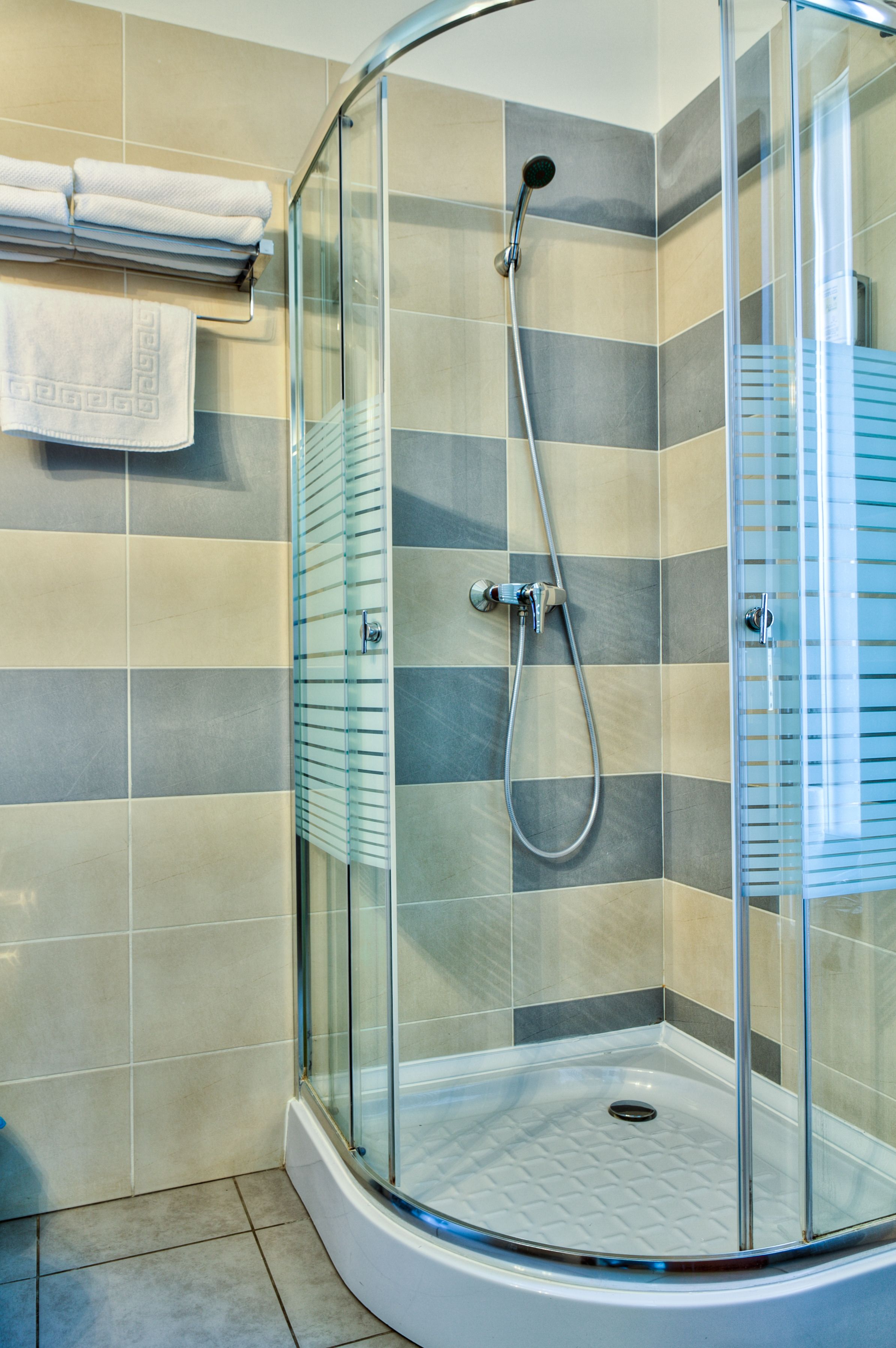 Studio Economy | Shower kamar mandi