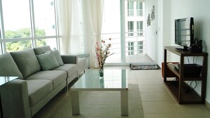Deluxe Condo, 3 Bedrooms, Balcony, City View | Living room - Luxury 3BR Condo HZ by TA (Cancun)