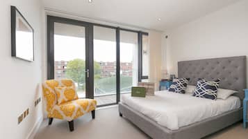 Deluxe One Bedroom Apartment with Balcony | In-room safe, iron/ironing board, cribs/infant beds, free WiFi