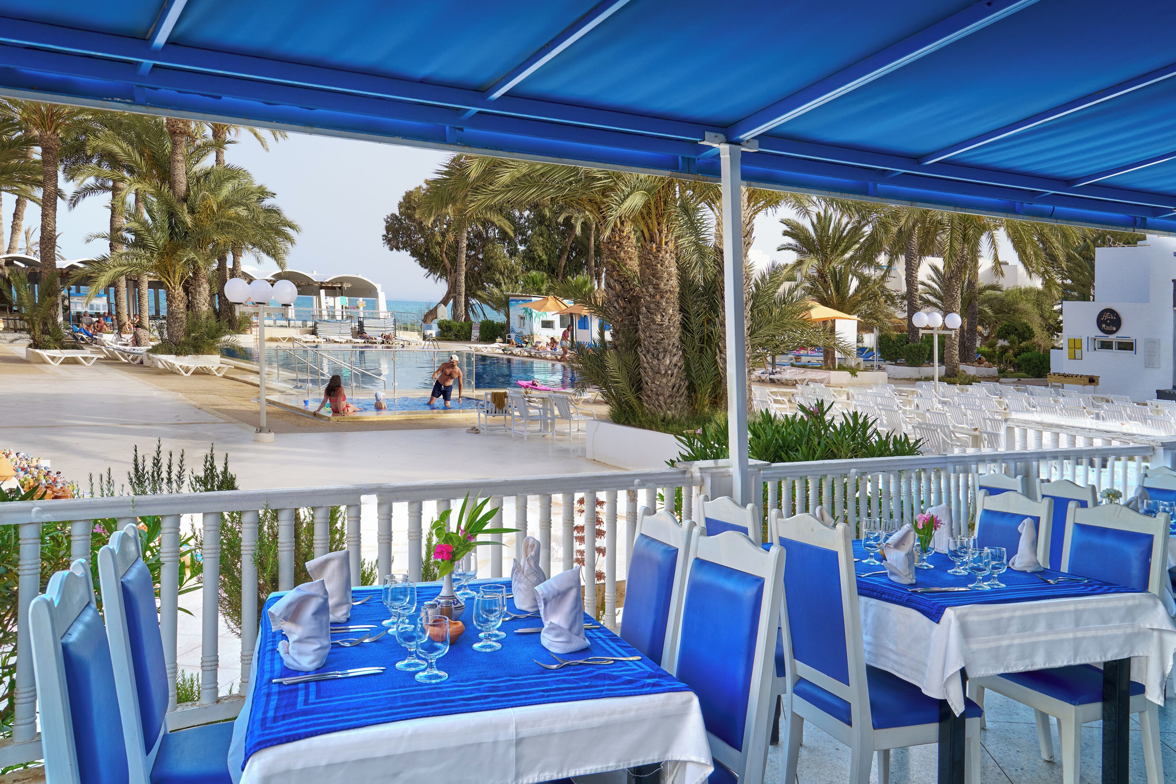 Indoor pool, outdoor pool, pool umbrellas, pool loungers