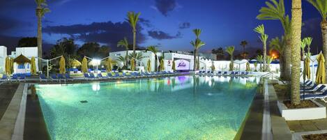 Indoor pool, outdoor pool, pool umbrellas, pool loungers