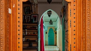 An ornate wooden archway with a sign reading "57-56 Riad Dar Mamouni." - Riad Dar Mamouni (Marrakech)