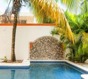 Outdoor pool, pool umbrellas, pool loungers