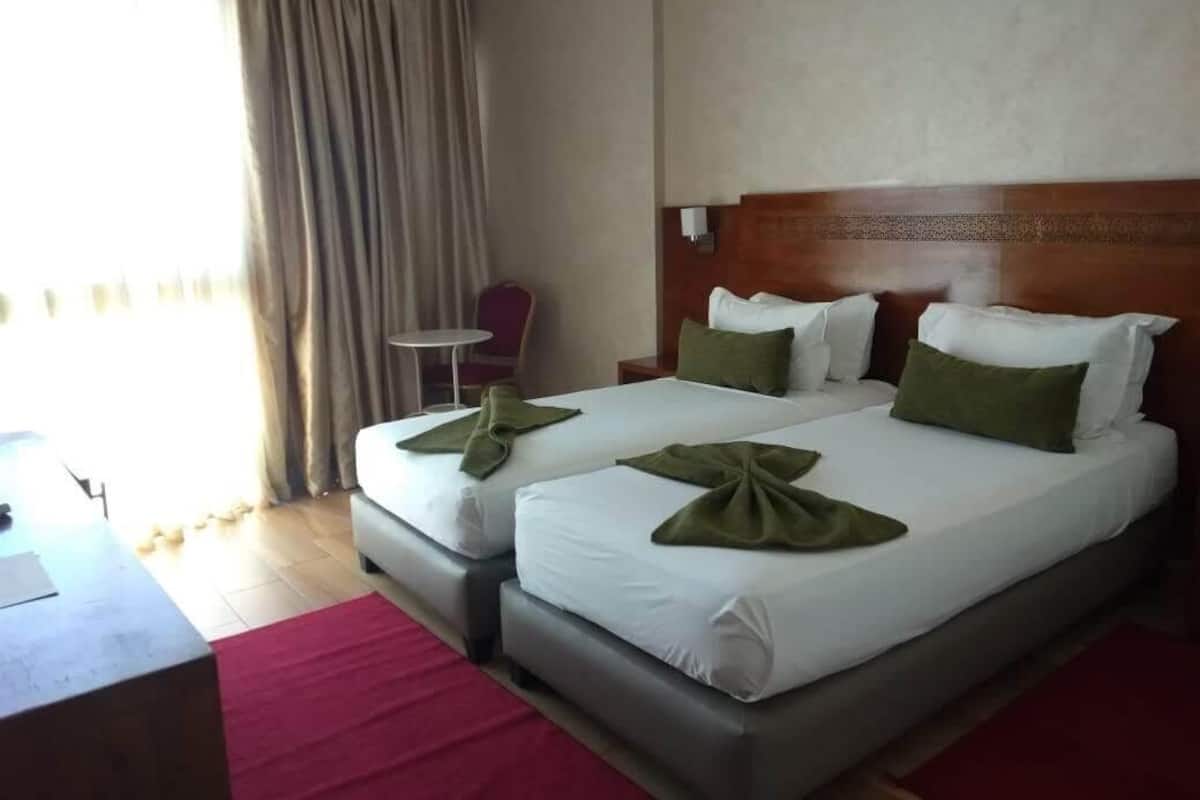Ropa de cama de alta calidad y minibar