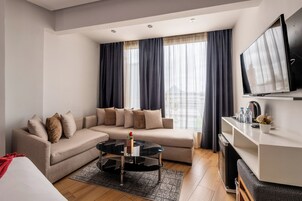 Ropa de cama de alta calidad y minibar 