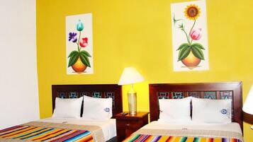 Double Room, 2 Queen Beds | In-room safe, individually decorated, desk, blackout drapes