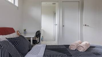 Basic Room, 1 Queen Bed, Private Bathroom | 4 bedrooms, free WiFi, bed sheets