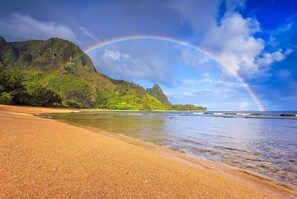 Enjoy breathtaking ocean views and serene mountain vistas from this tranquil beachside retreat.