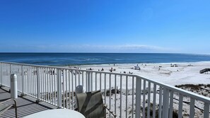 On the beach, sun-loungers