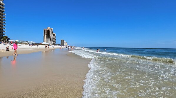 On the beach, sun-loungers