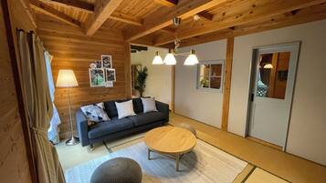 Holiday Home (Momiji) | Living area | Flat-screen TV