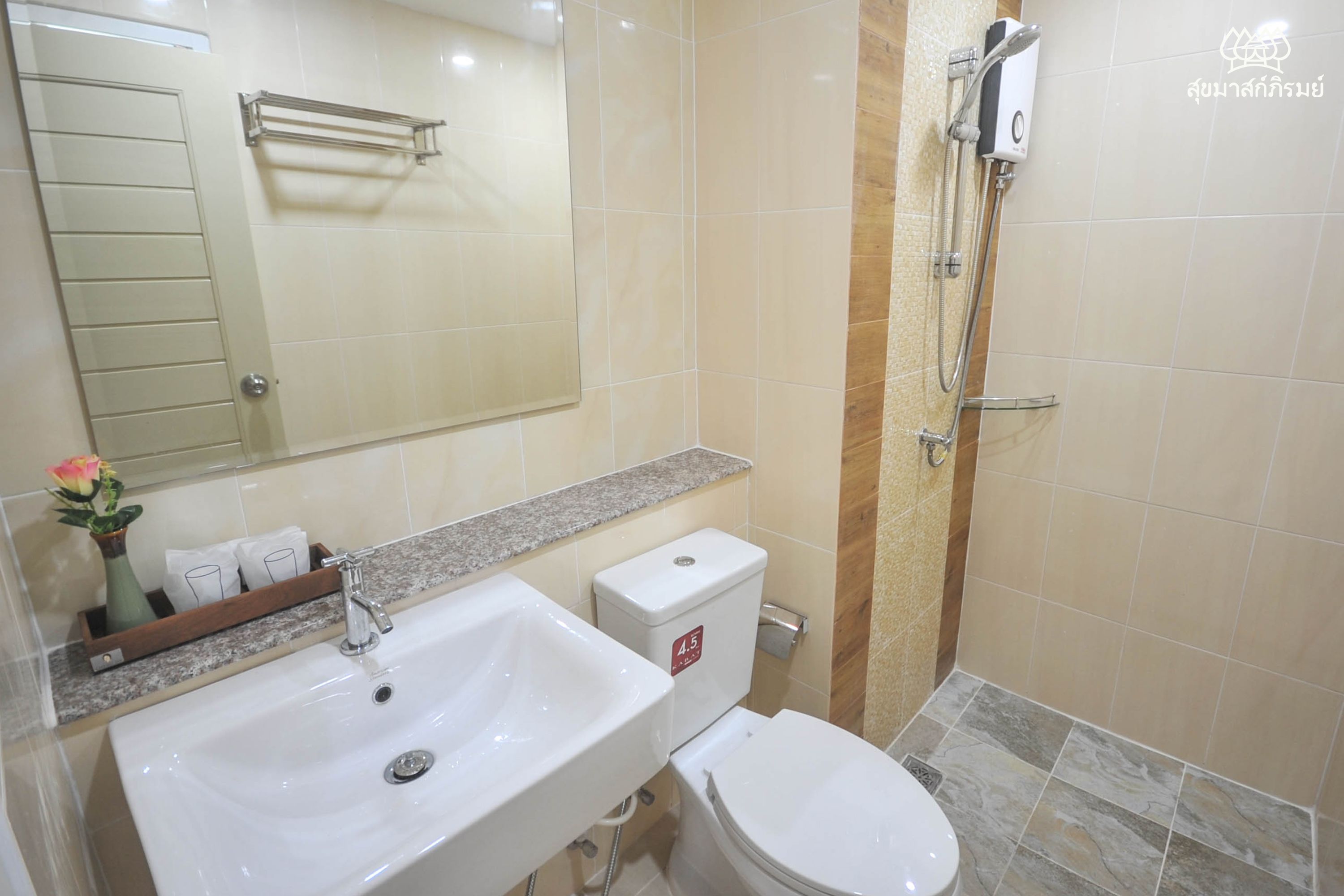 deluxe triple room | bathroom | shower, free toiletries, hair dryer, towels