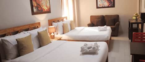 Desk, blackout drapes, rollaway beds, free WiFi