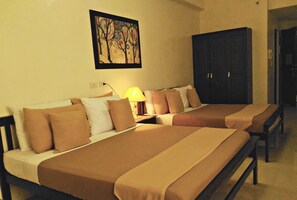 Family Quadruple Room, 2 Queen Beds | Desk, blackout drapes, rollaway beds, free WiFi - Residenciale Boutique Apartments (Quezon City)