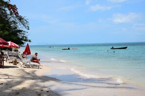On the beach, sun-loungers, snorkelling, beach bar