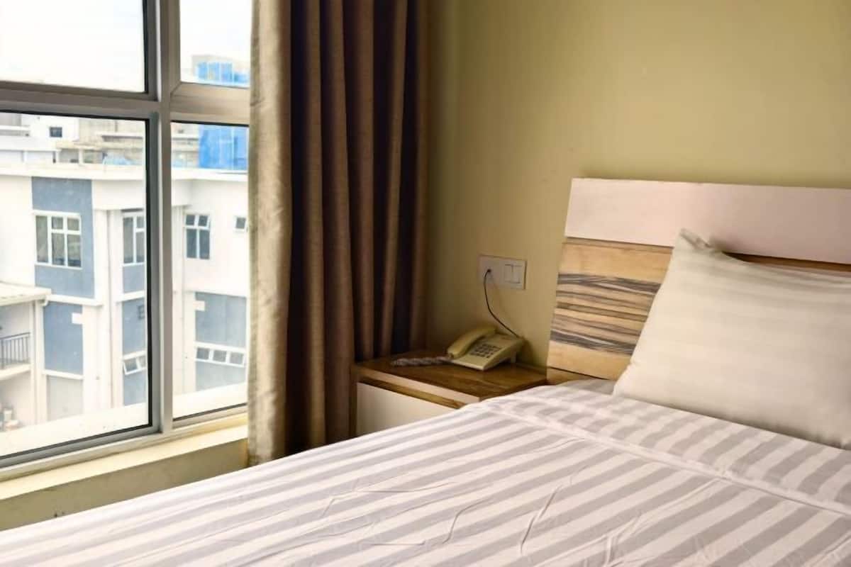 Premium bedding, desk, iron/ironing board (on request), free WiFi