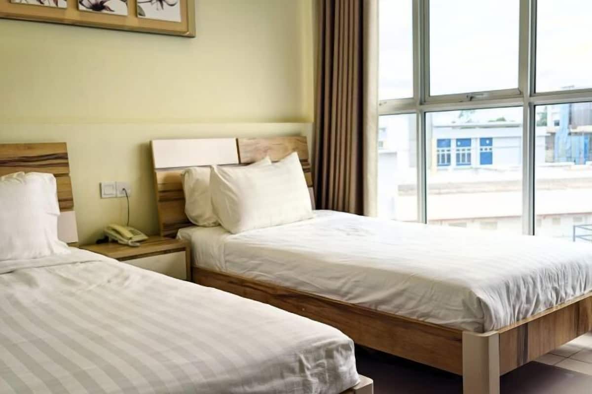 Premium bedding, desk, iron/ironing board (on request), free WiFi