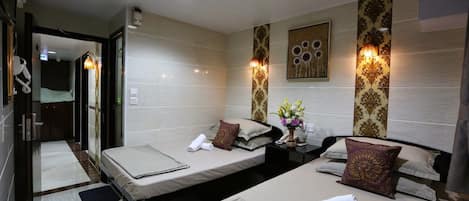 Family Room, Private Bathroom | Iron/ironing board, free WiFi, bed sheets