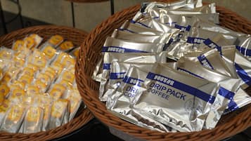 Two baskets filled with coffee packets.