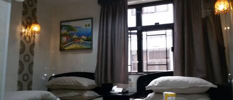 Family Room, Private Bathroom | Iron/ironing board, free WiFi, bed sheets