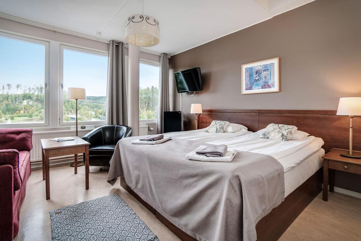 Double or Twin Room (with Sofa Bed) | In-room safe, desk, blackout curtains, iron/ironing board
