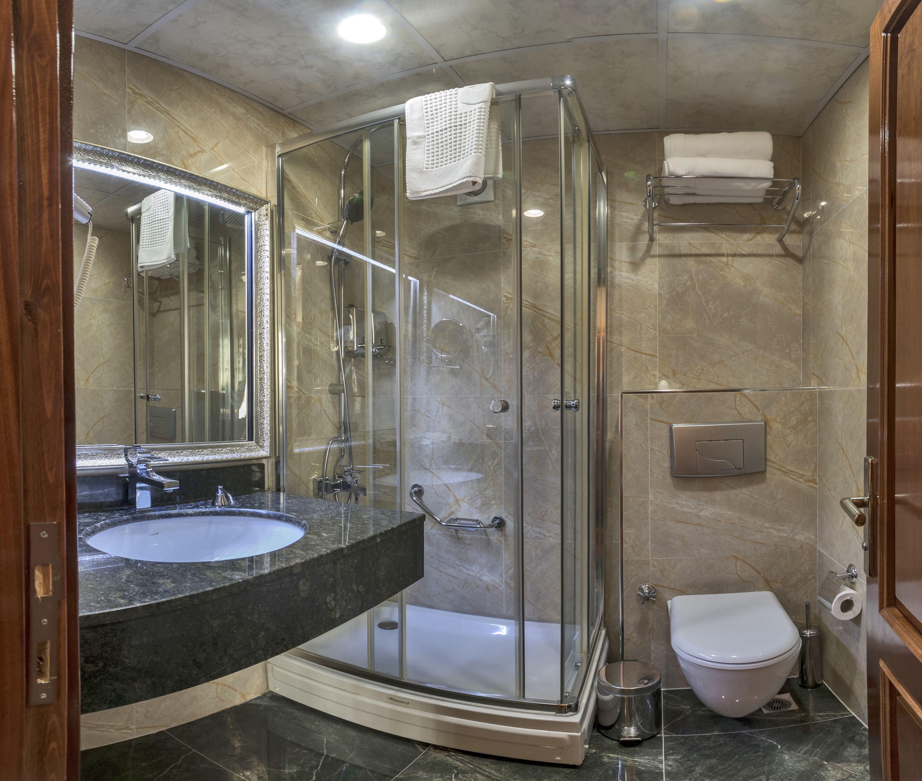 deep-soaking bathtub, free toiletries, hair dryer, towels