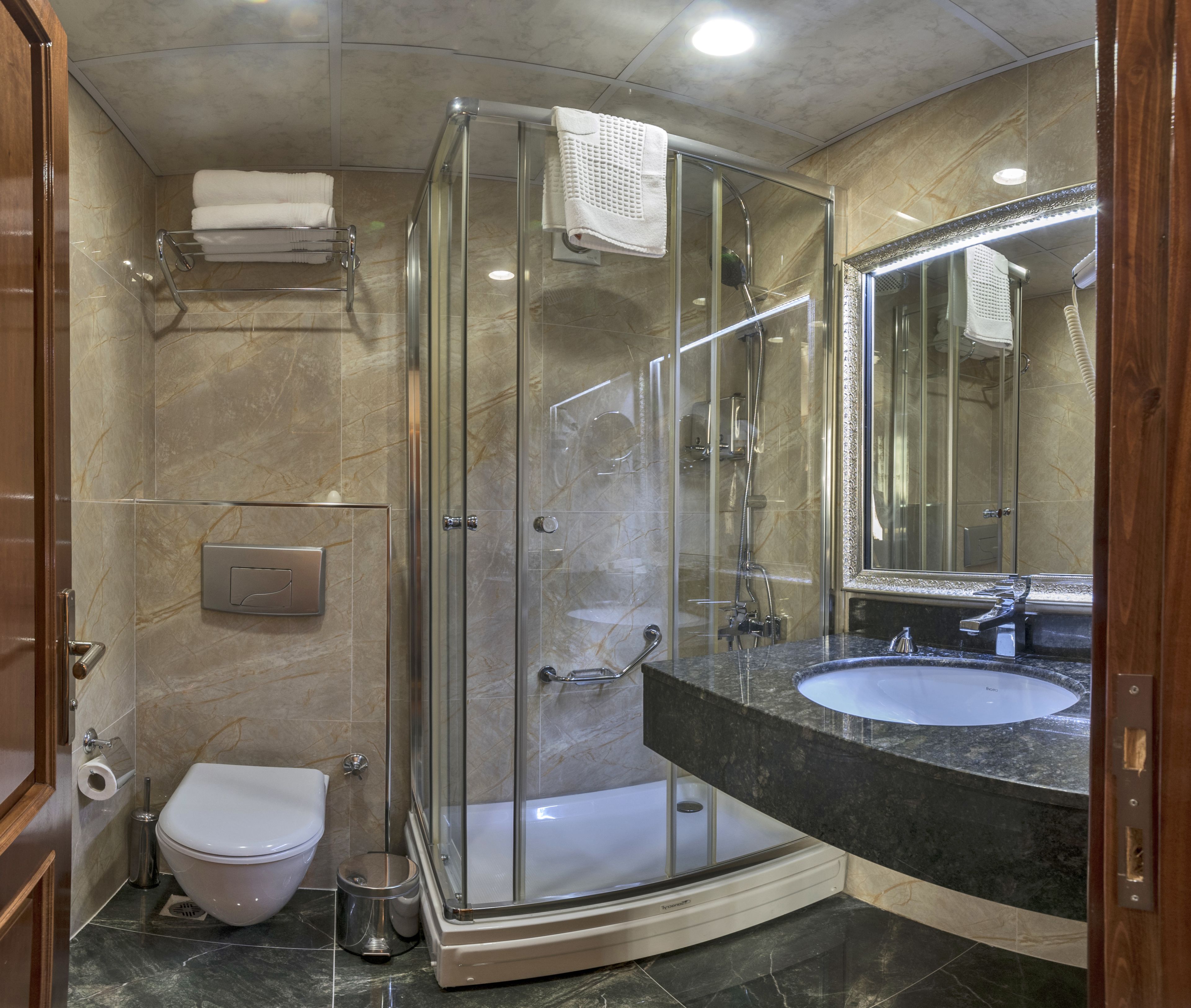 deep-soaking bathtub, free toiletries, hair dryer, towels