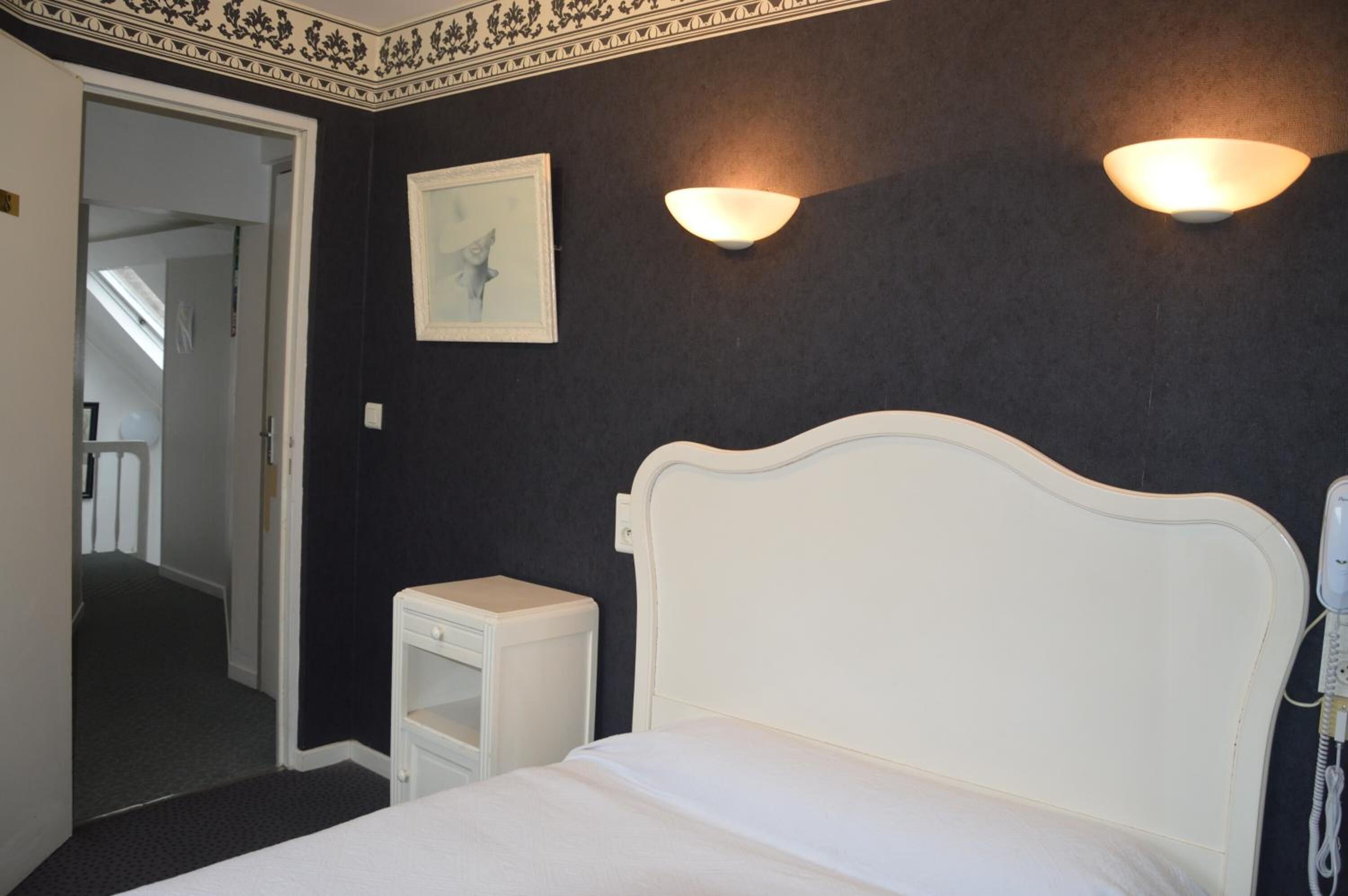 individually decorated, individually furnished, desk, rollaway beds