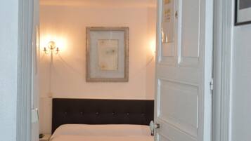 Individually decorated, individually furnished, desk, rollaway beds