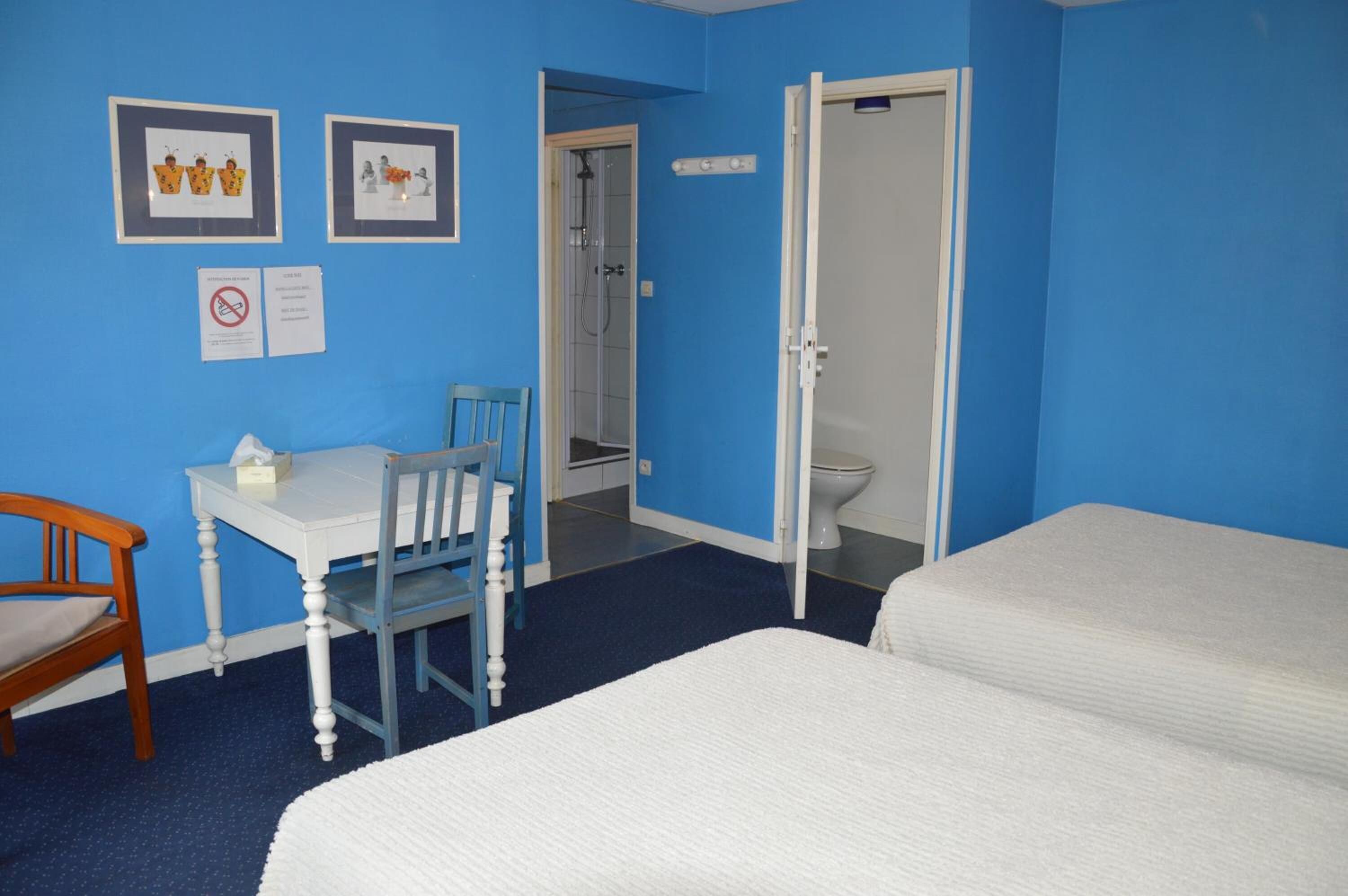 individually decorated, individually furnished, desk, rollaway beds