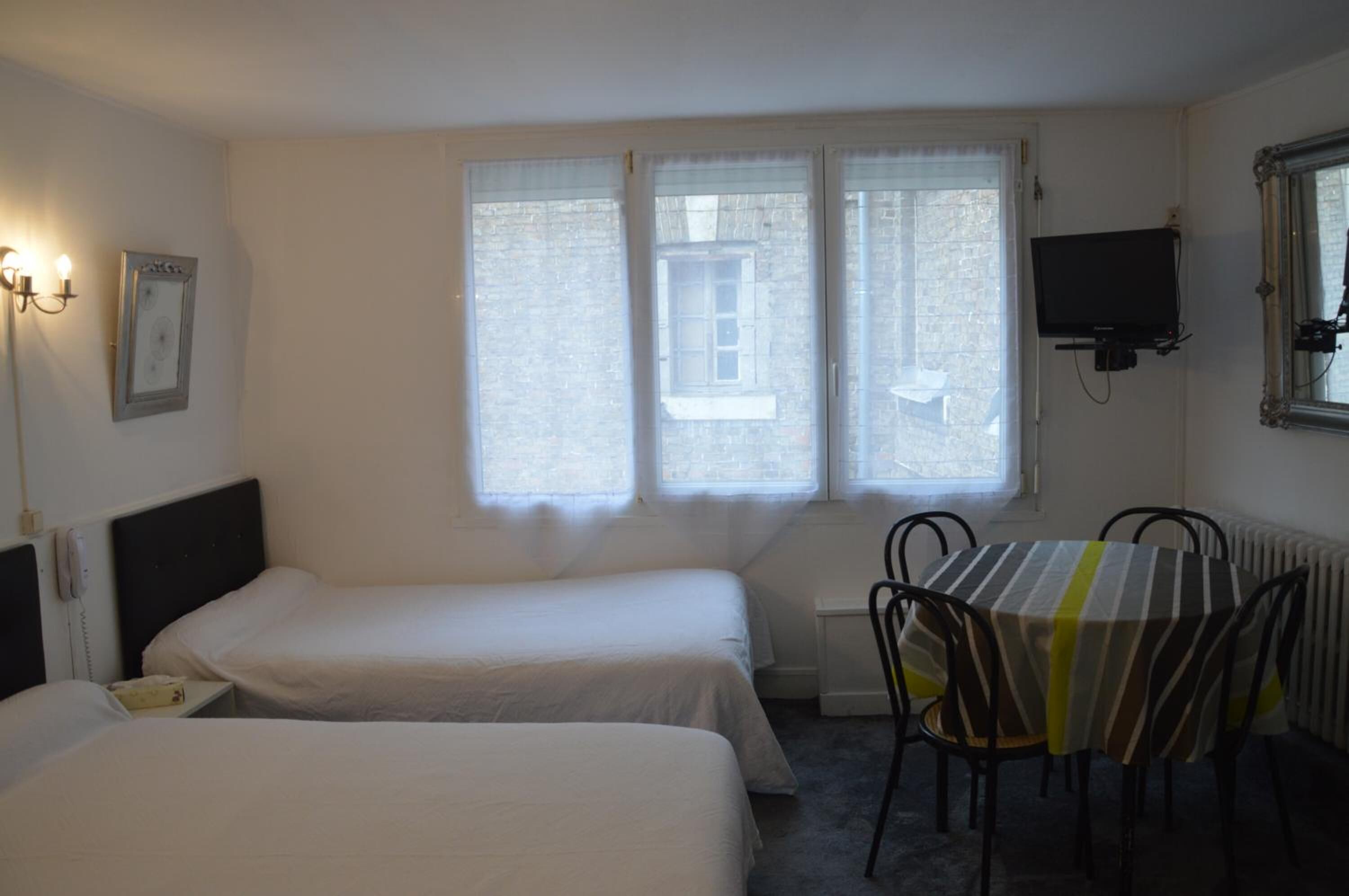 individually decorated, individually furnished, desk, rollaway beds