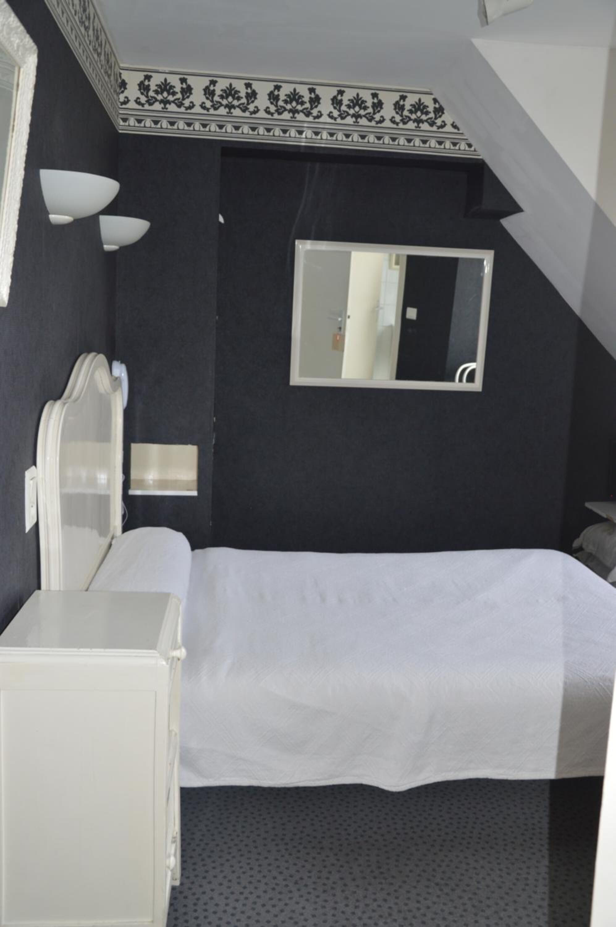 individually decorated, individually furnished, desk, rollaway beds