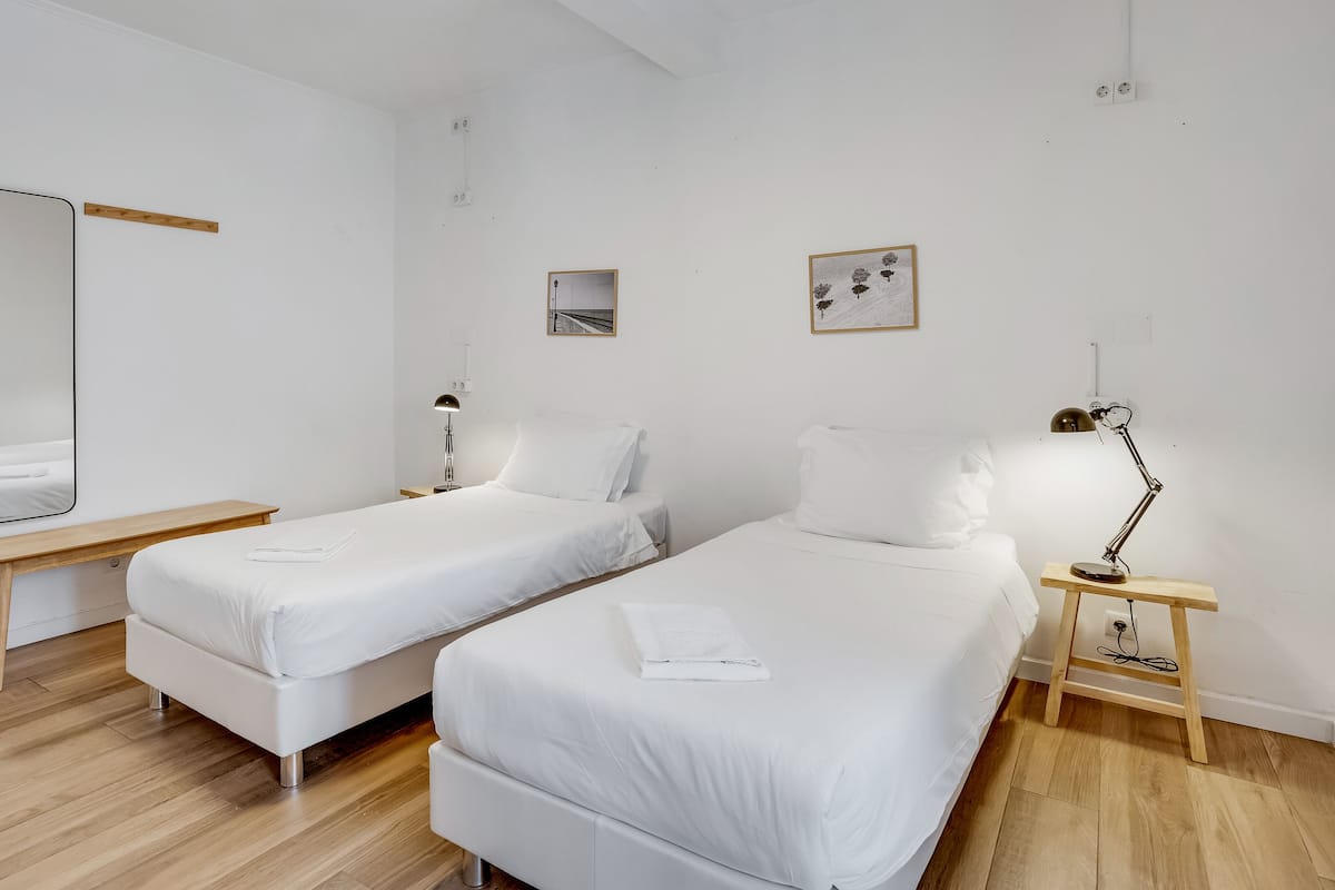 Twin Room, Private Bathroom | Iron/ironing board (on request), WiFi (free), bed sheets
