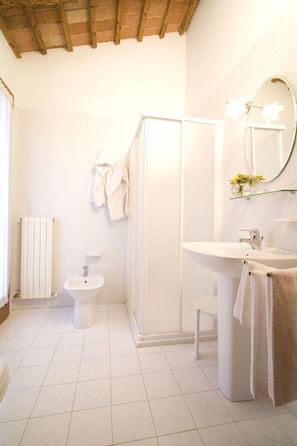 Double Room, Patio | Bathroom | Shower, free toiletries, hair dryer, bidet