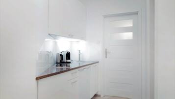 Apartment, 1 Schlafzimmer | Eigene Kochnische | Großer Kühlschrank, Mikrowelle, Herdplatte