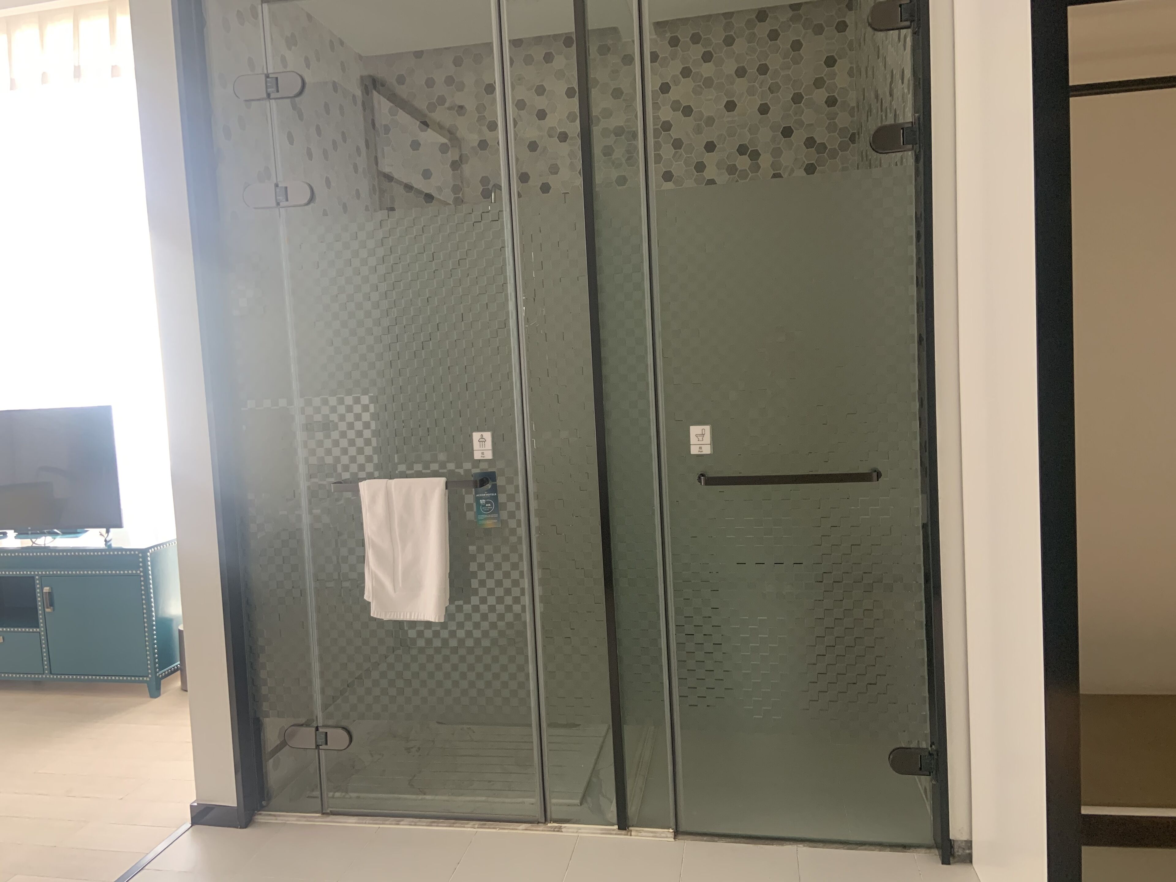 business twin room | bathroom | shower, hair dryer, towels