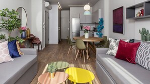 Premium Suite, 2 Bedrooms, Accessible, Terrace | Living area | Flat-screen TV - Suitcase (Thessaloniki)