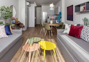 Premium Suite, 2 Bedrooms, Accessible, Terrace | Living area | Flat-screen TV - Suitcase (Thessaloniki)