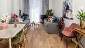 Family Apartment, 2 Bedrooms, Accessible, Kitchen | Living area | Flat-screen TV - Suitcase (Thessaloniki)