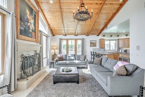 Smart TV, fireplace, books, music library