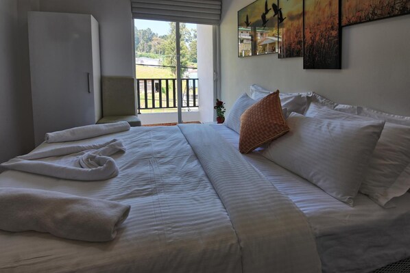 2 bedrooms, premium bedding, desk, laptop workspace