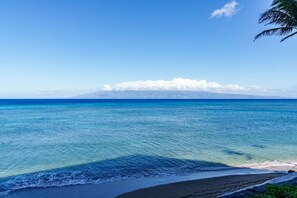 On the beach, sun-loungers, beach towels