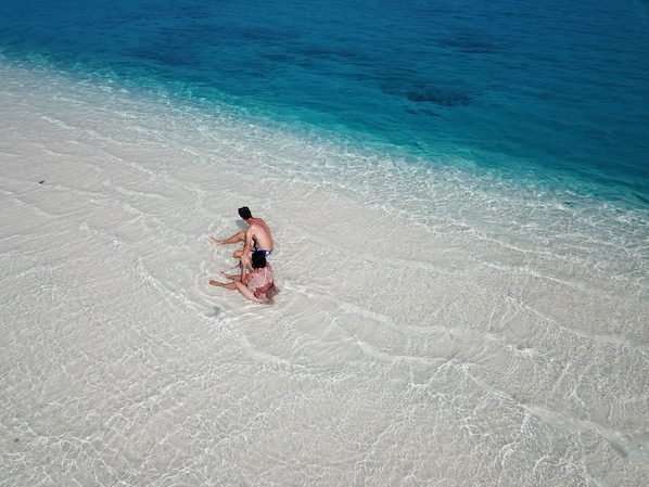 On the beach, scuba diving