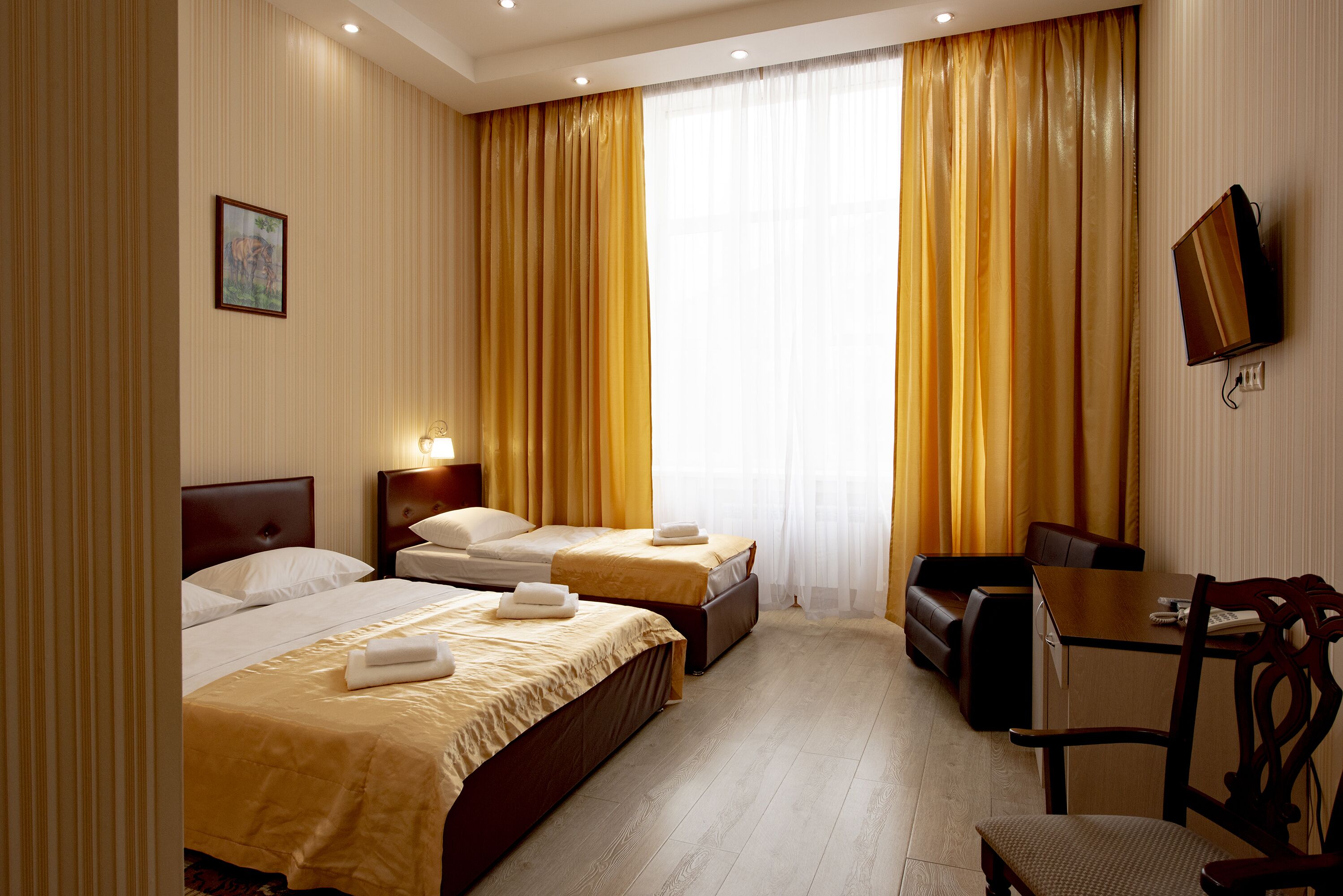 Family Room | Premium bedding, in-room safe, desk, laptop workspace